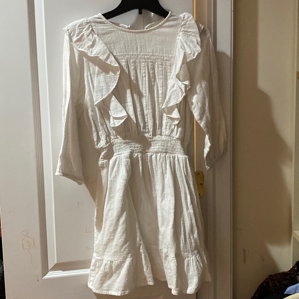 White ruffle mini dress, key hole in the back